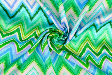 Viskose Satin mit Zickzack Muster, grün, 0,5 m